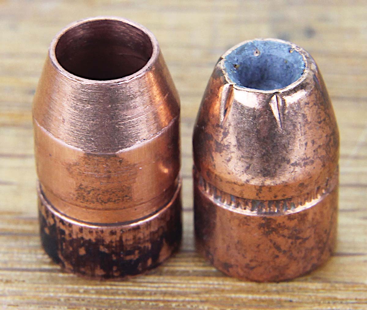 The yawning “jet engine intake” of the Ultramag tubular bullet’s nose (left) dwarfs the cavity of a standard JHP bullet (right).